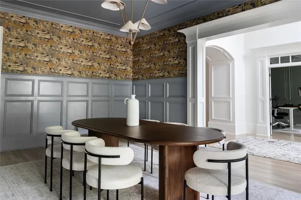 a living room with furniture fireplace and window