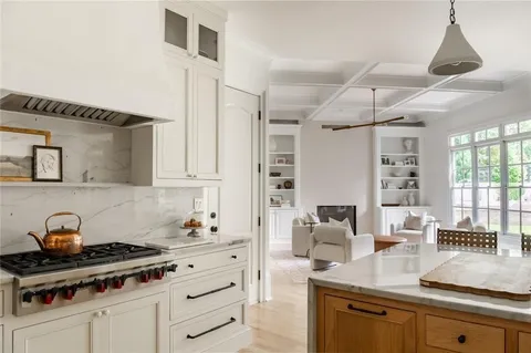 a bedroom with bed and window