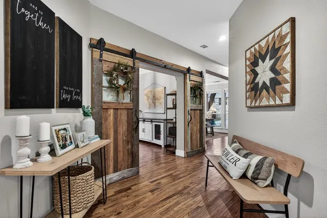 an aerial view of a house with outdoor space