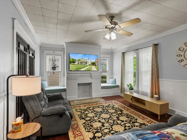 a kitchen with stainless steel appliances kitchen island granite countertop a stove and a sink