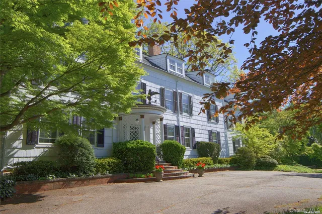 a building with trees in front of it
