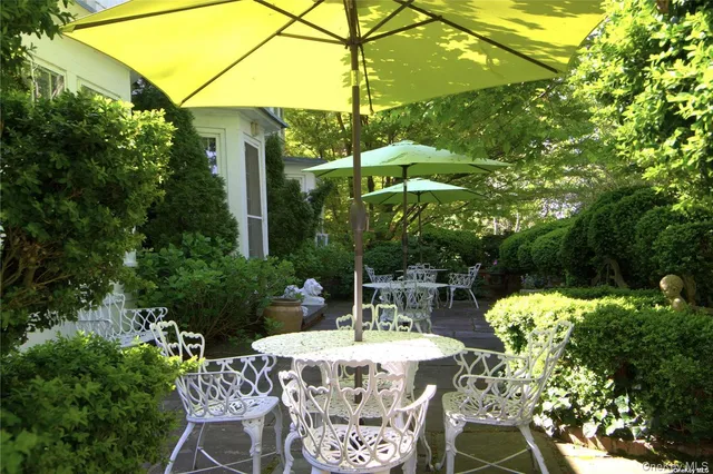 a view of yard with patio