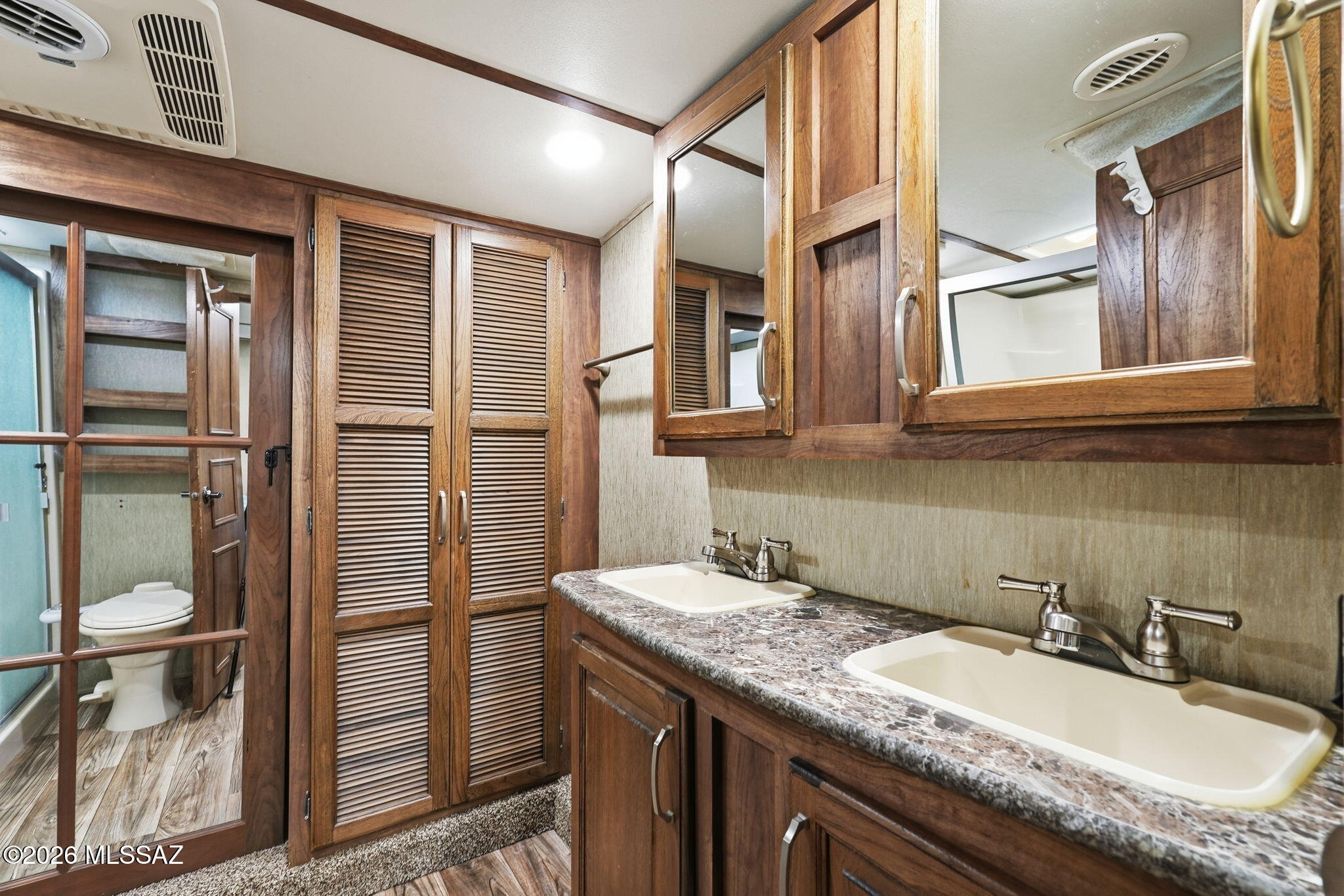 3515 East Rollins Road Tucson, AZ 85739 - Photo 15 of 30 Main bathroom dual sinks