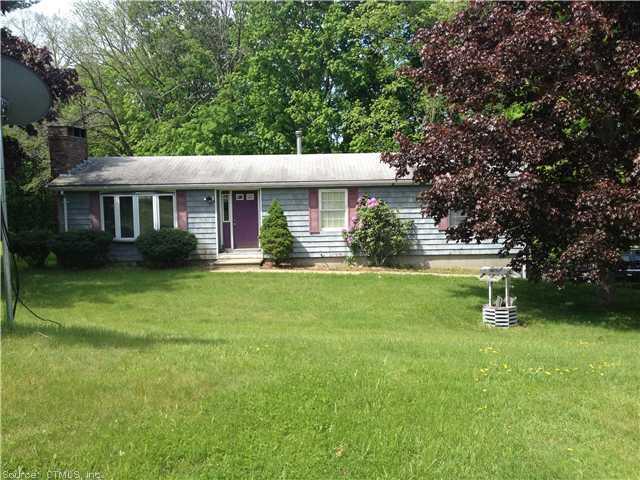 5 Nauset Avenue Killingly, CT 06239 - Photo 1 of 1 a front view of a house with a yard and green space