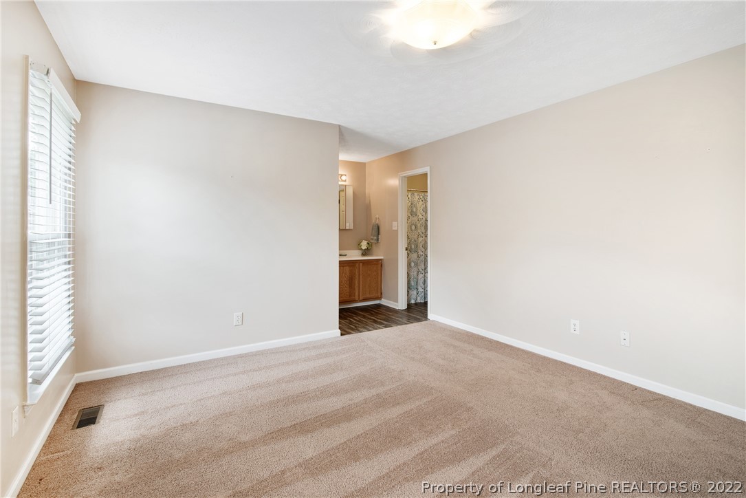 2064 Bainbridge Road Stedman, NC 28391 - Photo 17 of 43 a view of an empty room with a window
