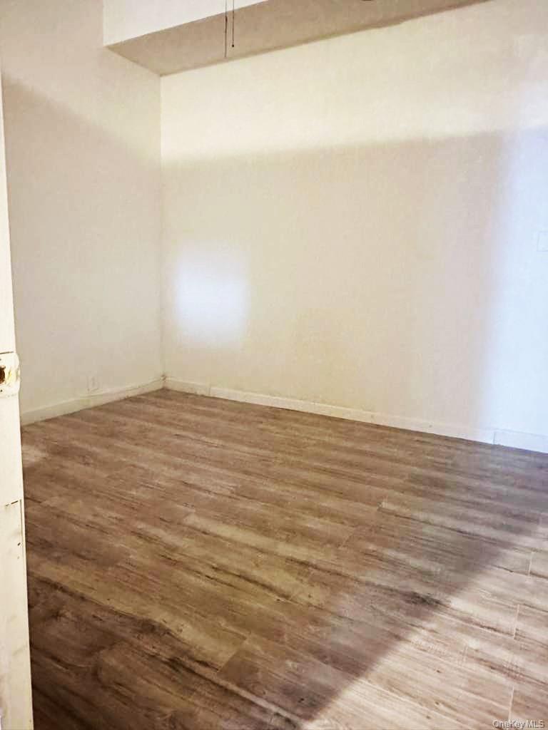88-22 85th Street Queens, NY 11421 - Photo 15 of 39 a view of an empty room