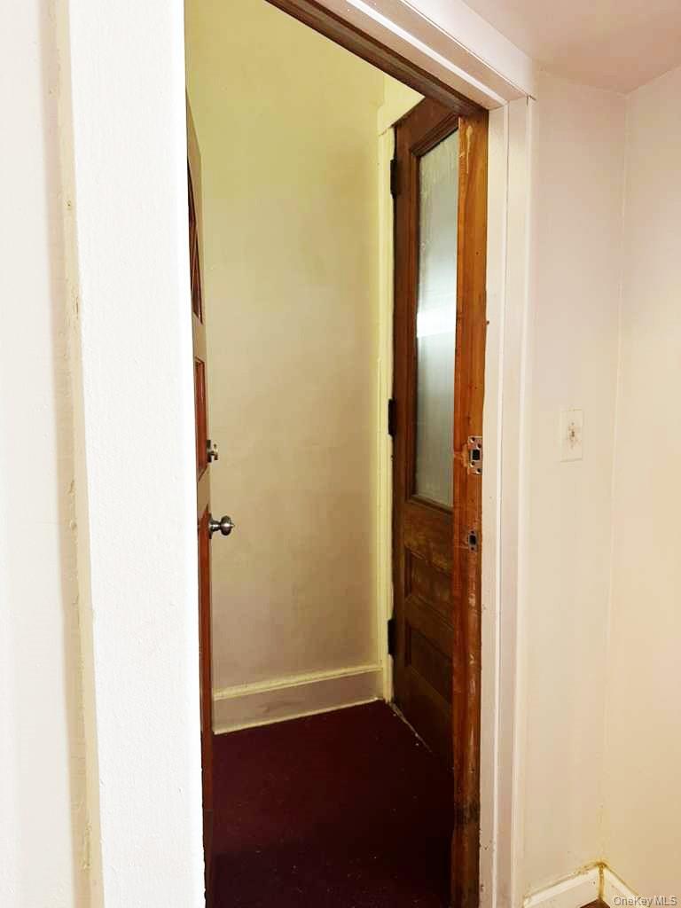 88-22 85th Street Queens, NY 11421 - Photo 20 of 39 a view of a bathroom with a glass door