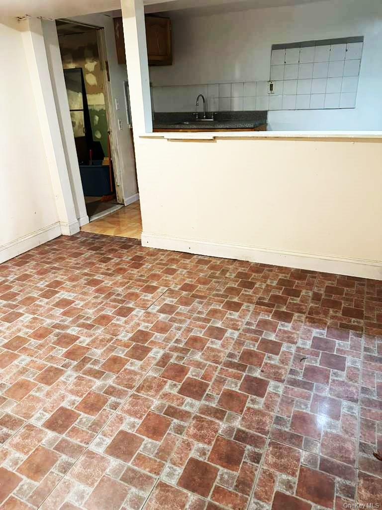 88-22 85th Street Queens, NY 11421 - Photo 25 of 39 a view of a wooden floor
