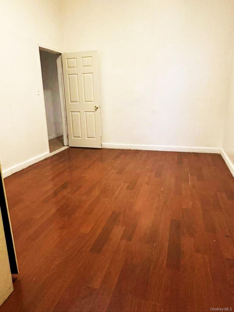 88-22 85th Street Queens, NY 11421 - Photo 35 of 39 a view of an empty room