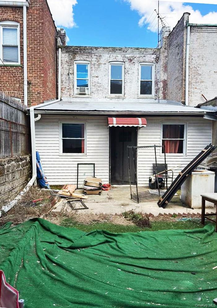 88-22 85th Street Queens, NY 11421 - Photo 39 of 39 a view of a house with backyard