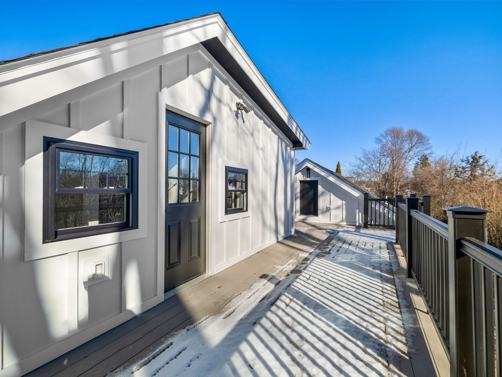 58 Townly Road Watertown, MA 02472 - Photo 24 of 42 a view of a house with a deck