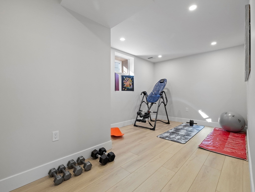 58 Townly Road Watertown, MA 02472 - Photo 36 of 42 a view of a room with gym equipment