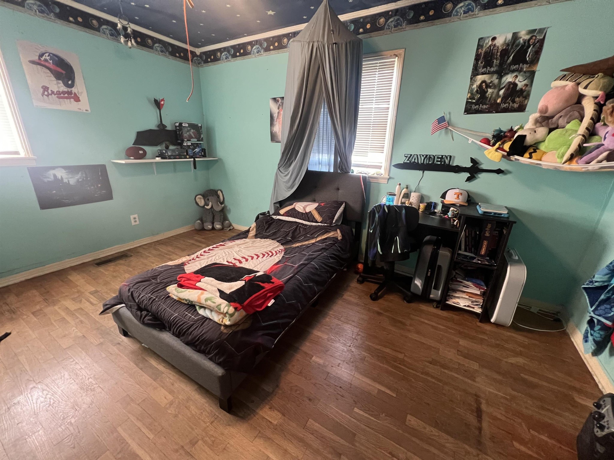 65 Walnut Street Savannah, TN 38372 - Photo 13 of 18 a living room with furniture and a wooden floor