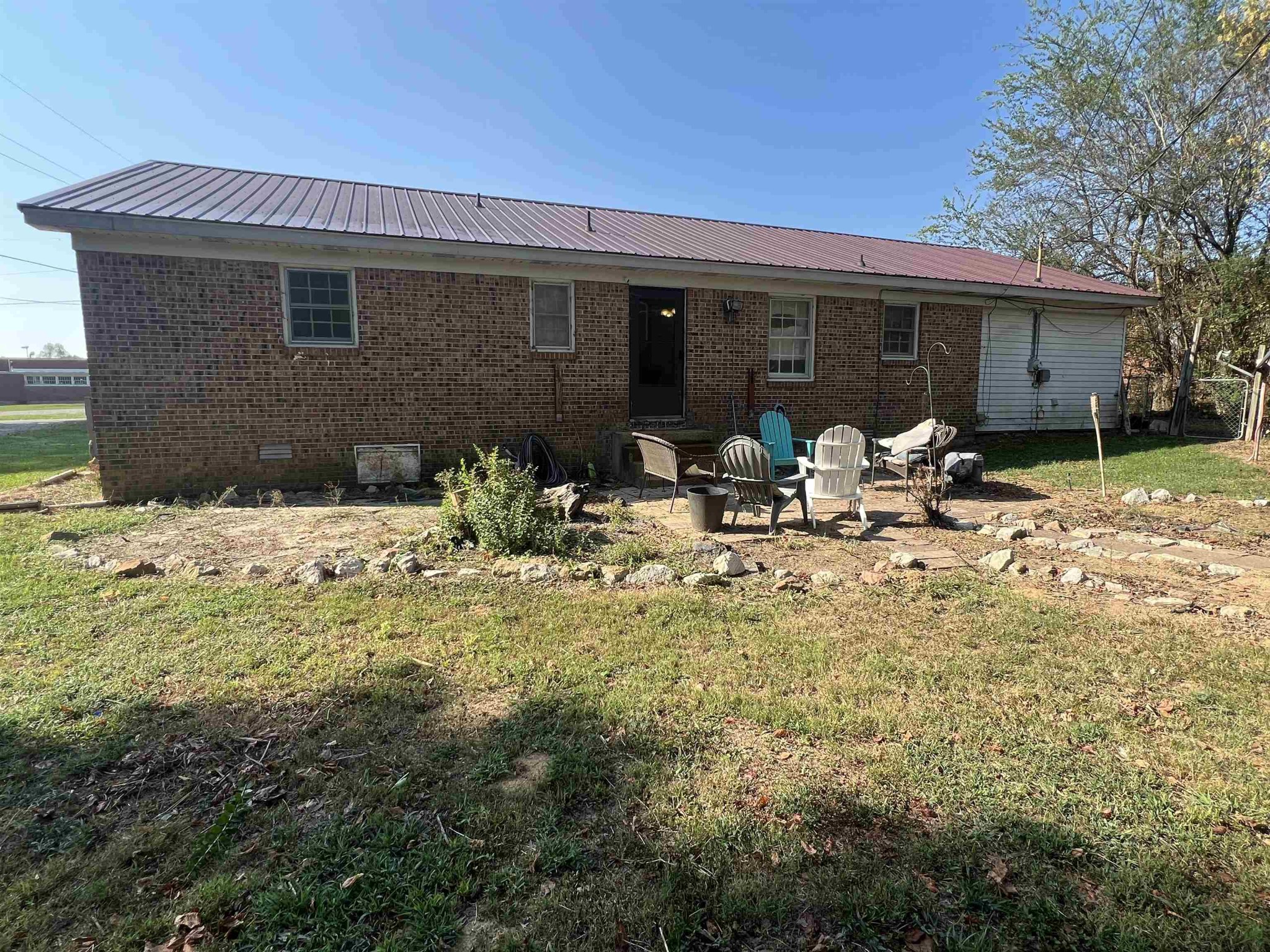 65 Walnut Street Savannah, TN 38372 - Photo 15 of 18 a view of house with yard