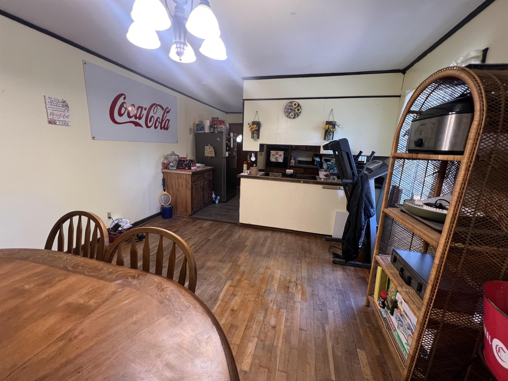 65 Walnut Street Savannah, TN 38372 - Photo 5 of 18 a bedroom with furniture and a wooden floor