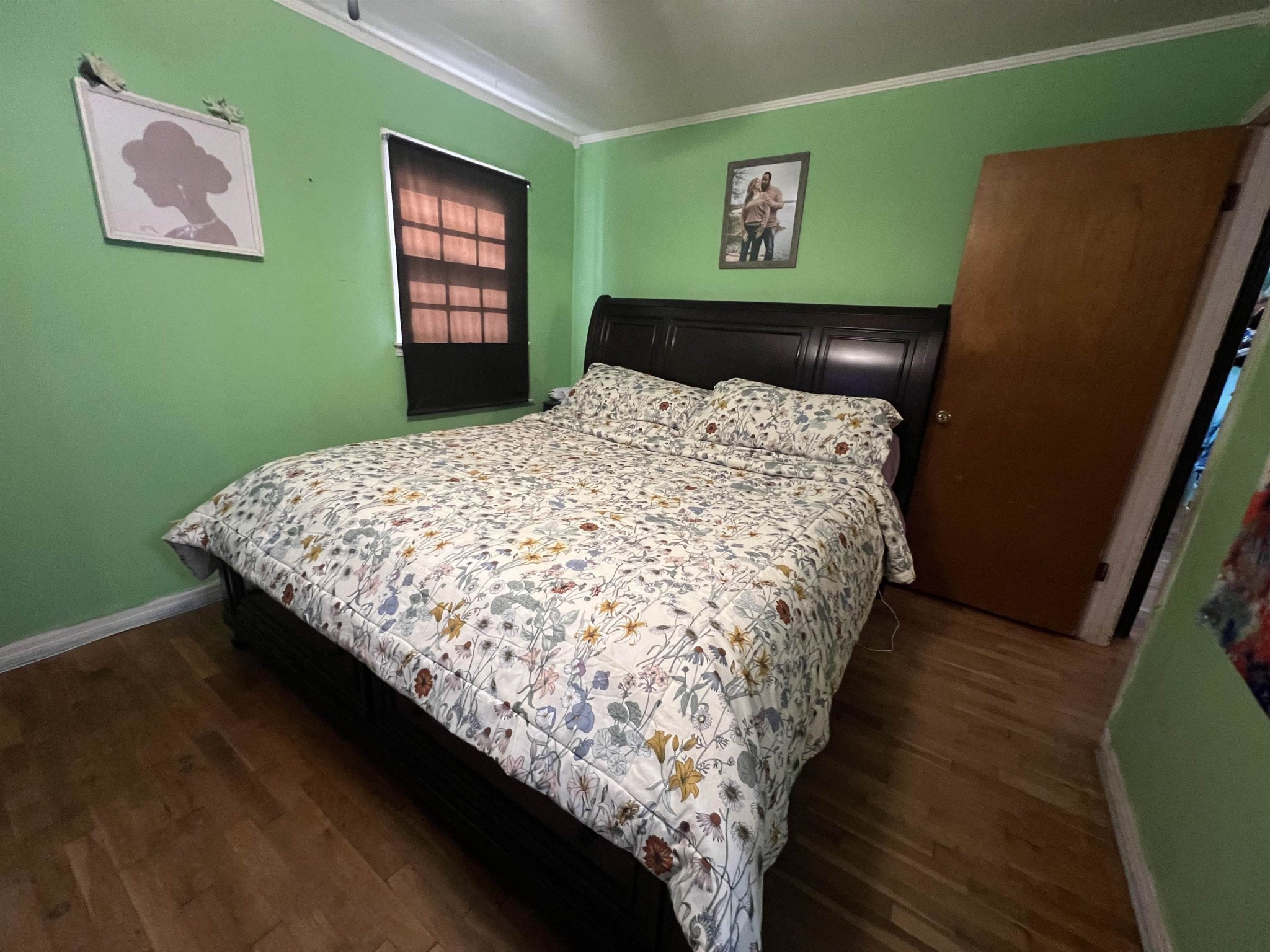 65 Walnut Street Savannah, TN 38372 - Photo 9 of 18 a bed sitting in a bedroom next to a window