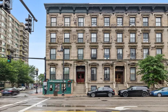 a view of a building and a street