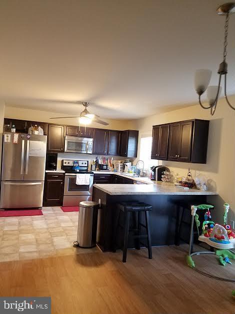 20 Sandy Lane Stafford, VA 22554 - Photo 3 of 15 a kitchen with cabinets and window