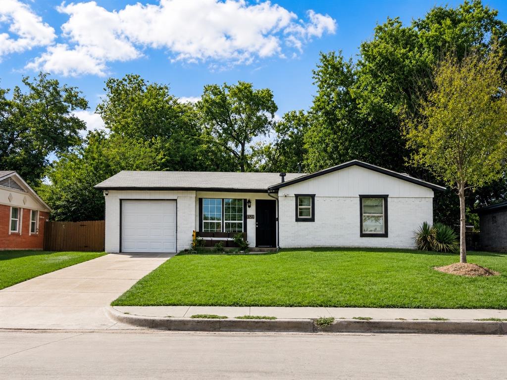 1125 Ridgeview Street Mesquite, TX 75149 - Photo 1 of 14 White painted brick exterior with black trim windows, a single-car garage, and a concrete driveway