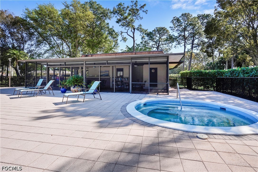 413 Augusta Boulevard, Unit 105 Naples, FL 34113 - Photo 43 of 45 a view of a house with sitting area and furniture