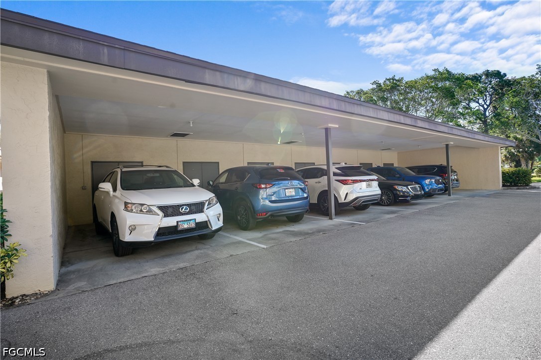 413 Augusta Boulevard, Unit 105 Naples, FL 34113 - Photo 45 of 45 a view of car parking