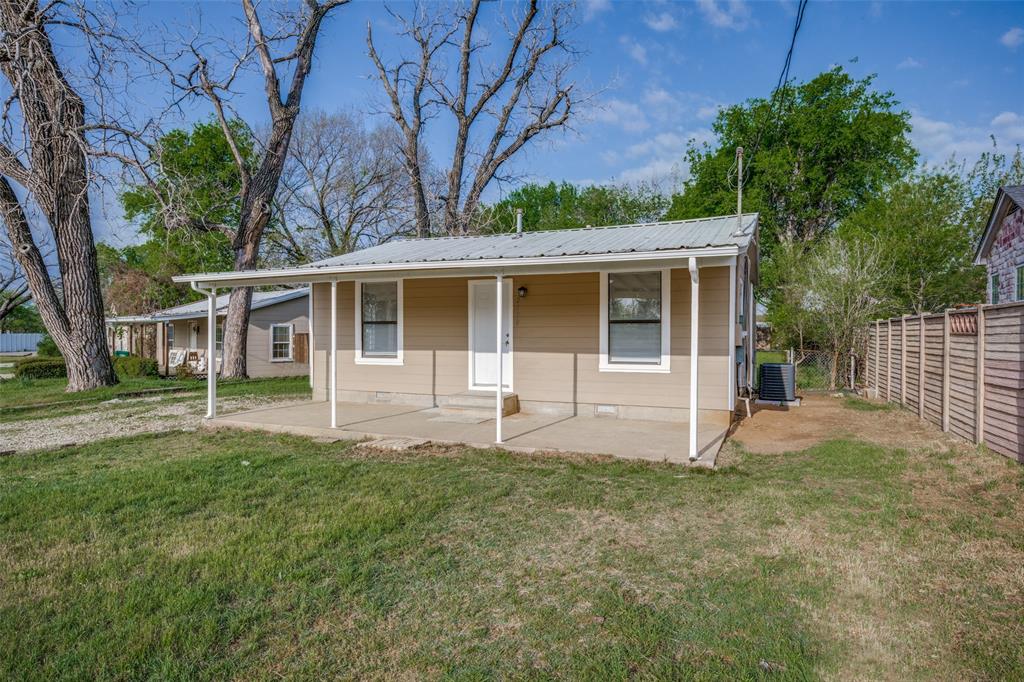 2500 Roselawn Drive Denton, TX 76205 - Photo 1 of 1 front view of a house with a yard