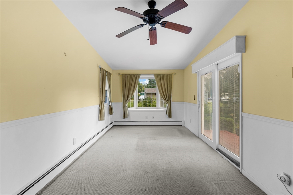 95 Brookside Road Somerset, MA 02726 - Photo 11 of 42 a view of n empty room with a window