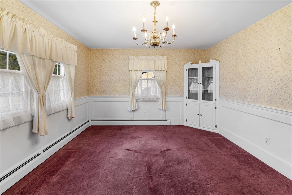 95 Brookside Road Somerset, MA 02726 - Photo 14 of 42 a view of empty room with wooden floor and fan