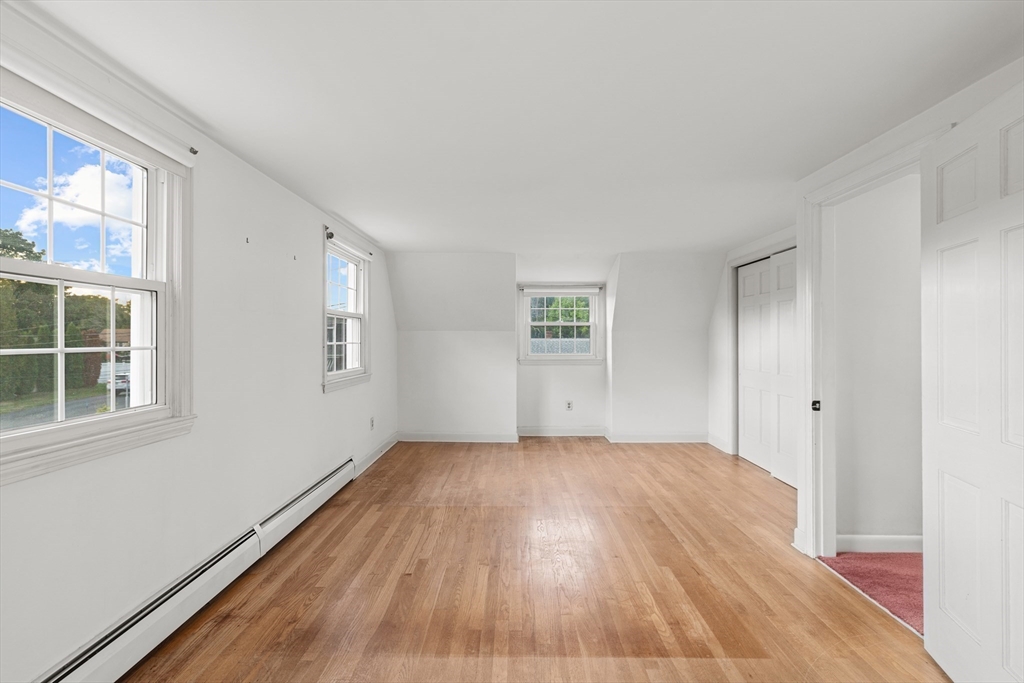 95 Brookside Road Somerset, MA 02726 - Photo 20 of 42 wooden floor in an empty room with a window