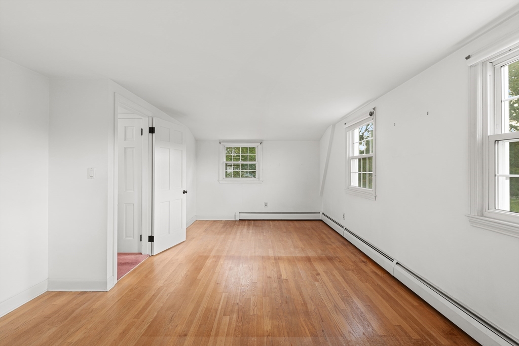 95 Brookside Road Somerset, MA 02726 - Photo 22 of 42 a view of a room with wooden floor and window