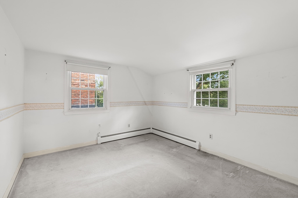 95 Brookside Road Somerset, MA 02726 - Photo 27 of 42 an empty room with windows