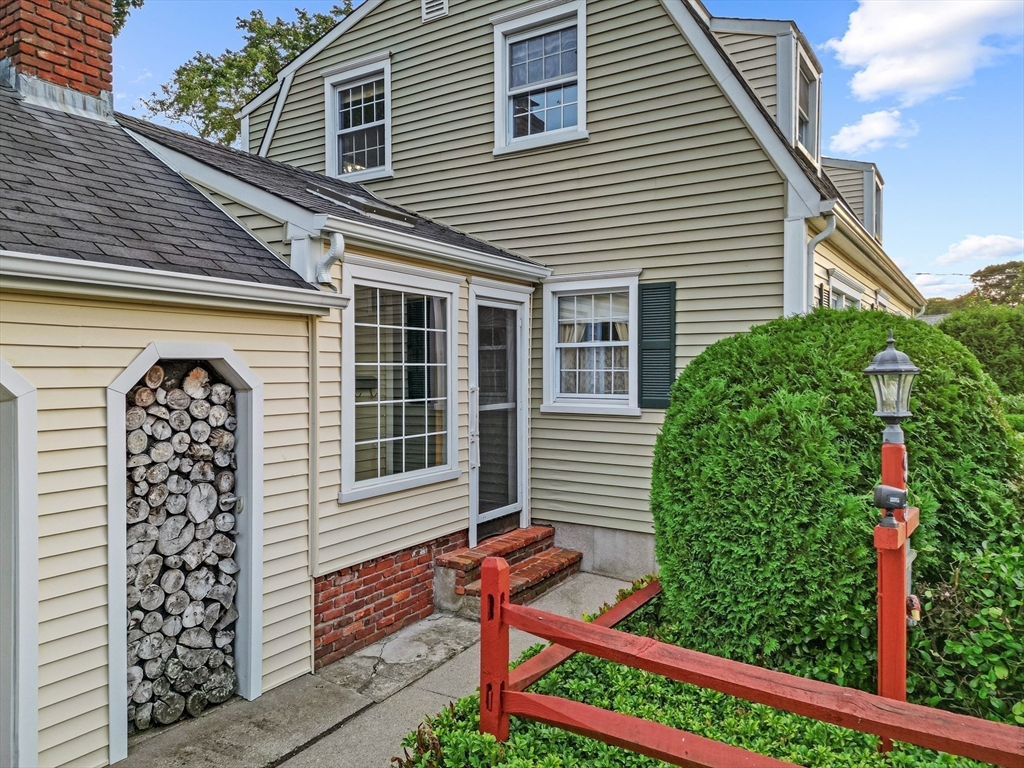 95 Brookside Road Somerset, MA 02726 - Photo 31 of 42 a front view of a house with garden