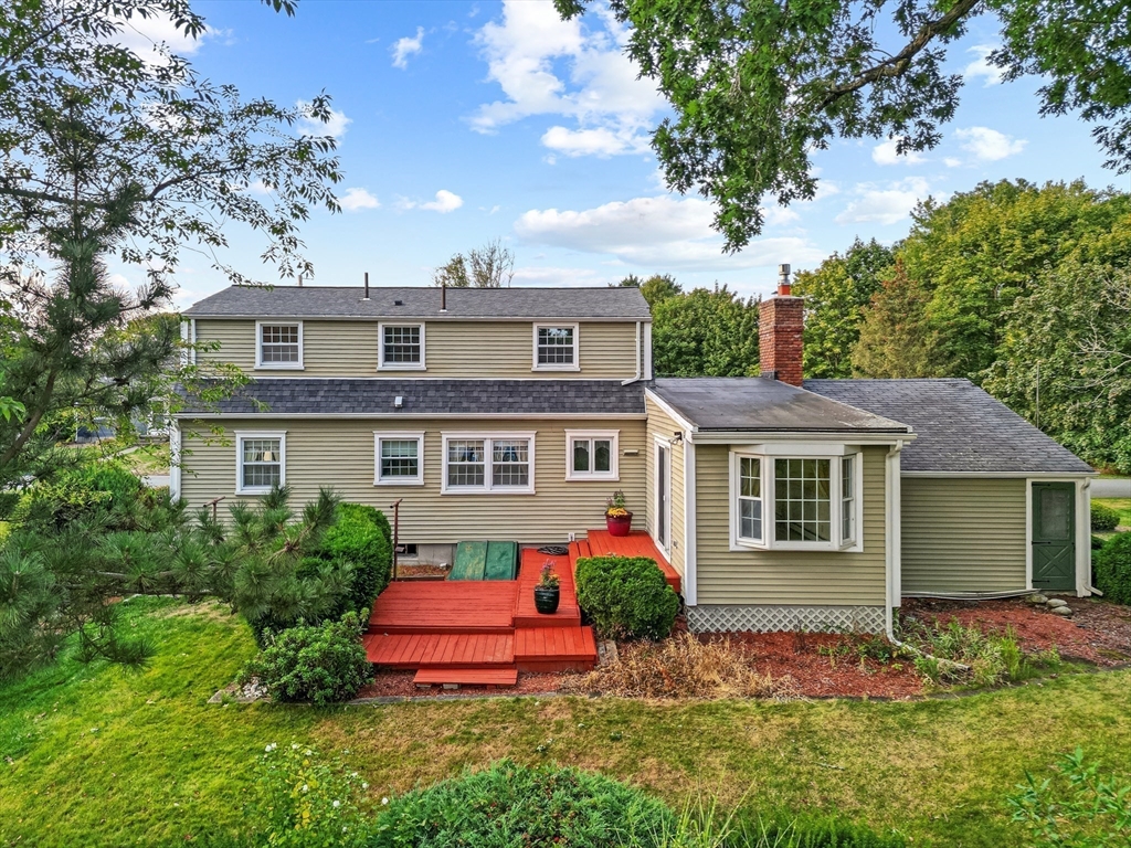 95 Brookside Road Somerset, MA 02726 - Photo 32 of 42 a front view of house with yard and green space