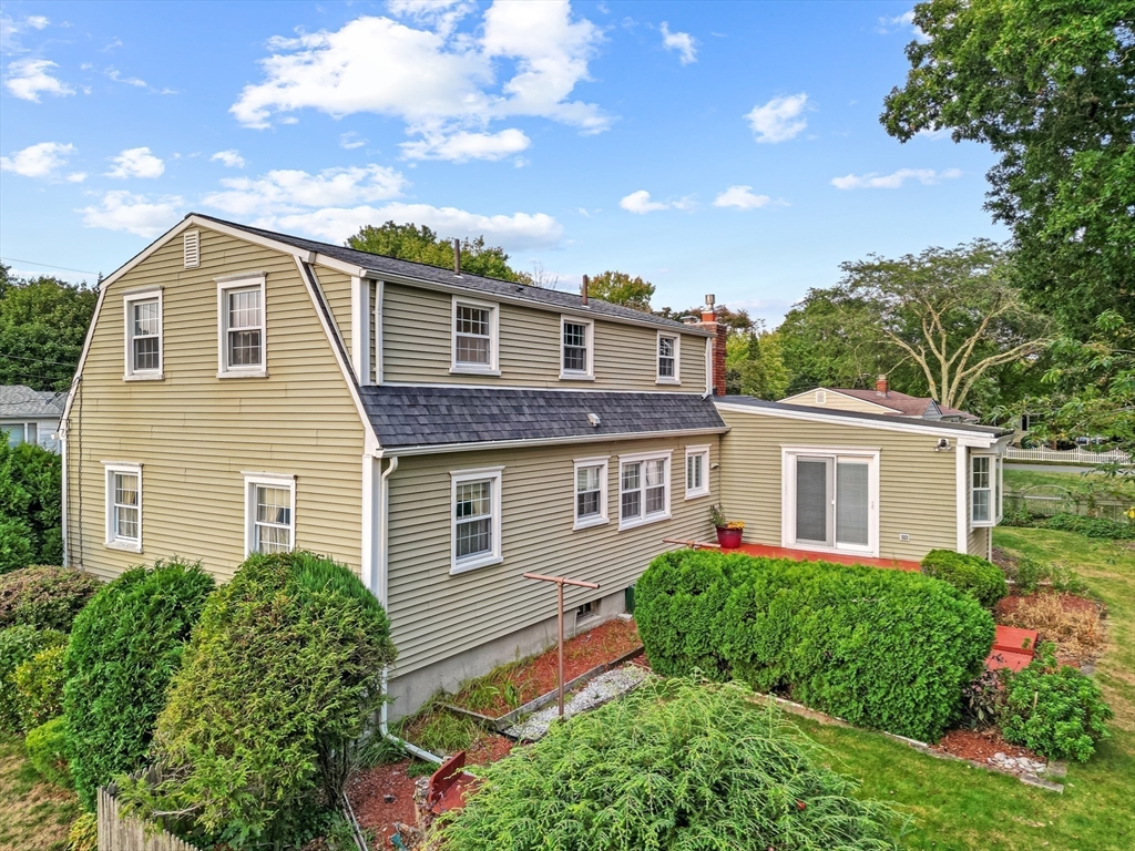95 Brookside Road Somerset, MA 02726 - Photo 37 of 42 a front view of a house with garden