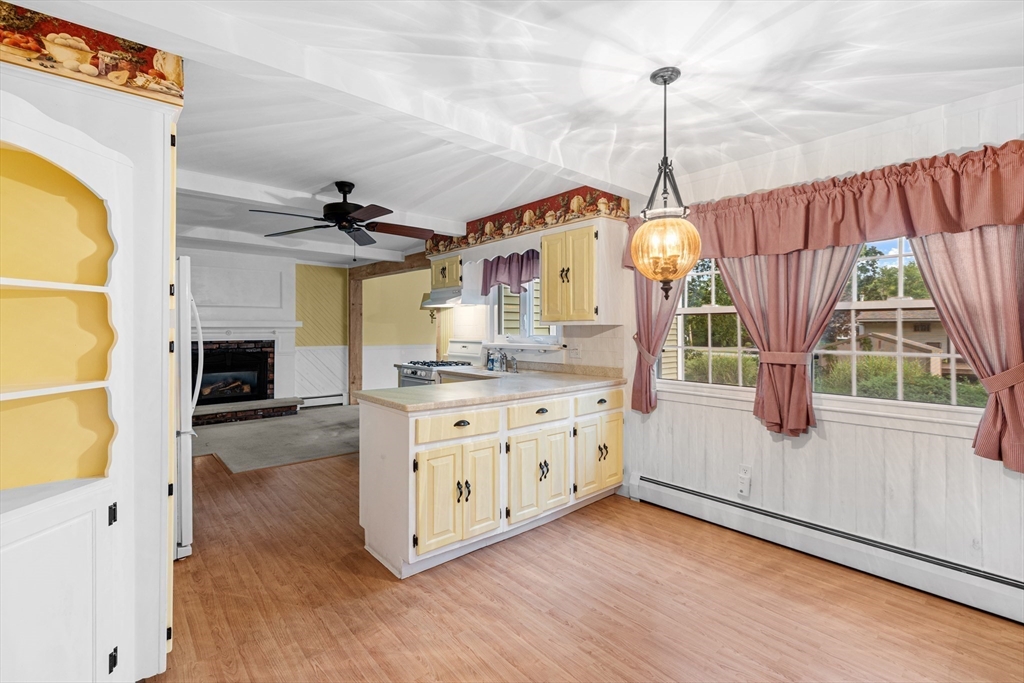 95 Brookside Road Somerset, MA 02726 - Photo 9 of 42 a kitchen that has a lot of windows and furniture