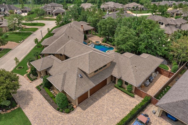 24803 Pearl Crest Lane Spring, TX 77389 - Photo 49 of 50 PERFECTION down to every last detail, including deluxe Zoysia grass, neatly quarantined pool equipment, and more! Pride of ownership here is priceless! Welcome home to exceptional 24803 Pearl Crest Lane!