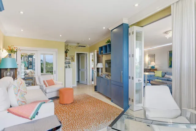 a living room with furniture and a table