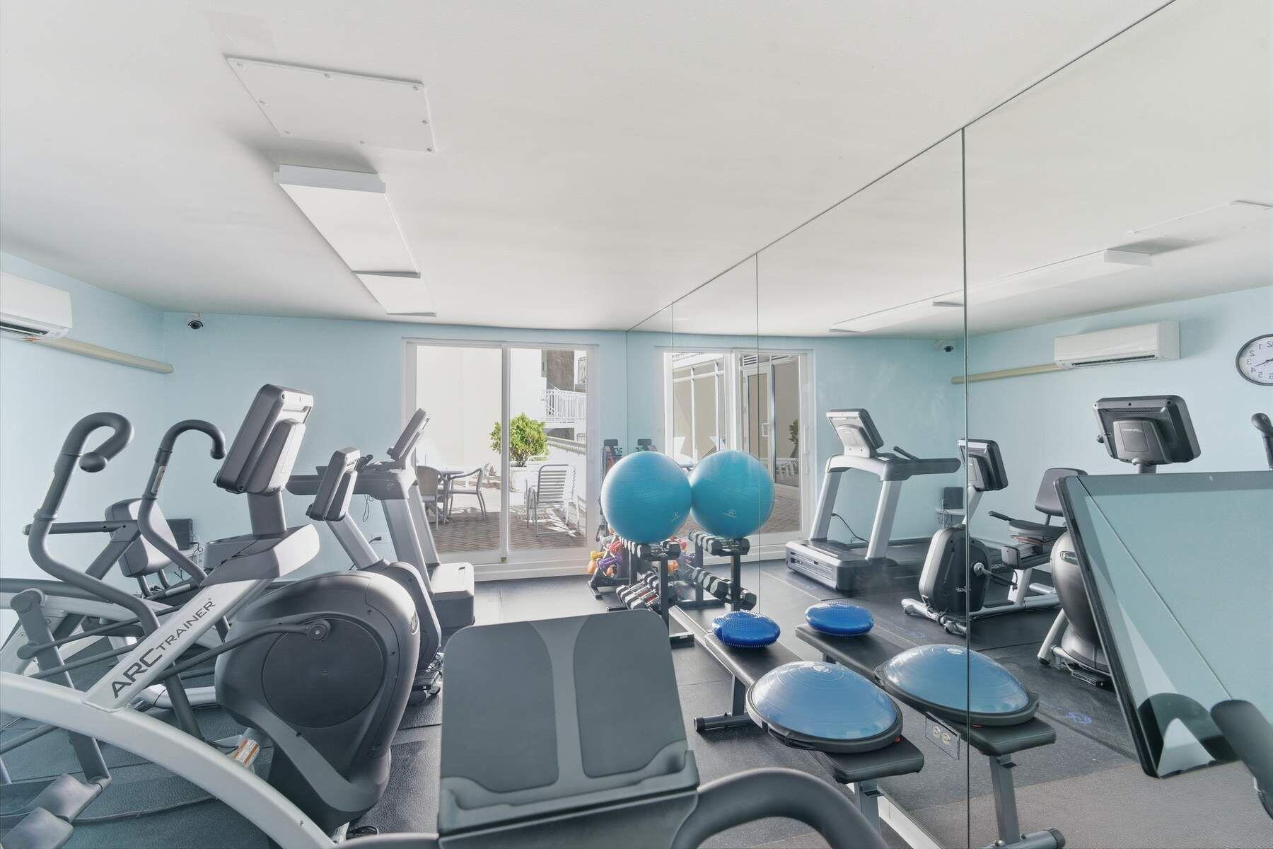100 Royal Palm Way, Unit F4 Palm Beach, FL 33480 - Photo 26 of 28 a living room with furniture and wooden floor