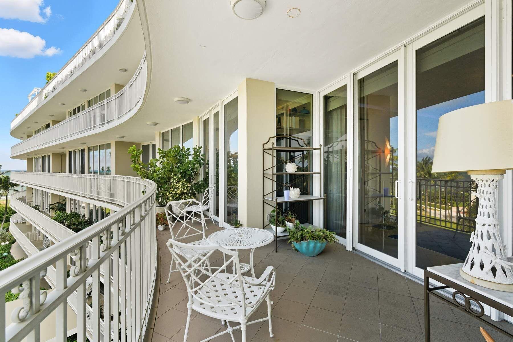 100 Royal Palm Way, Unit F4 Palm Beach, FL 33480 - Photo 3 of 28 a view of a balcony with chairs