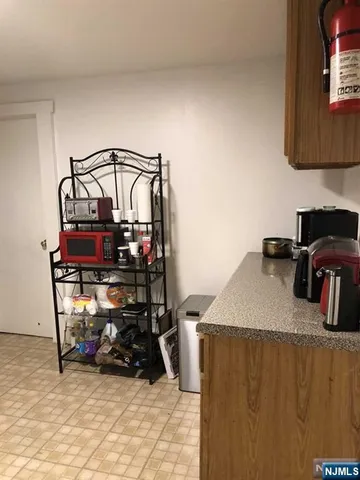 a kitchen with a stove and a microwave