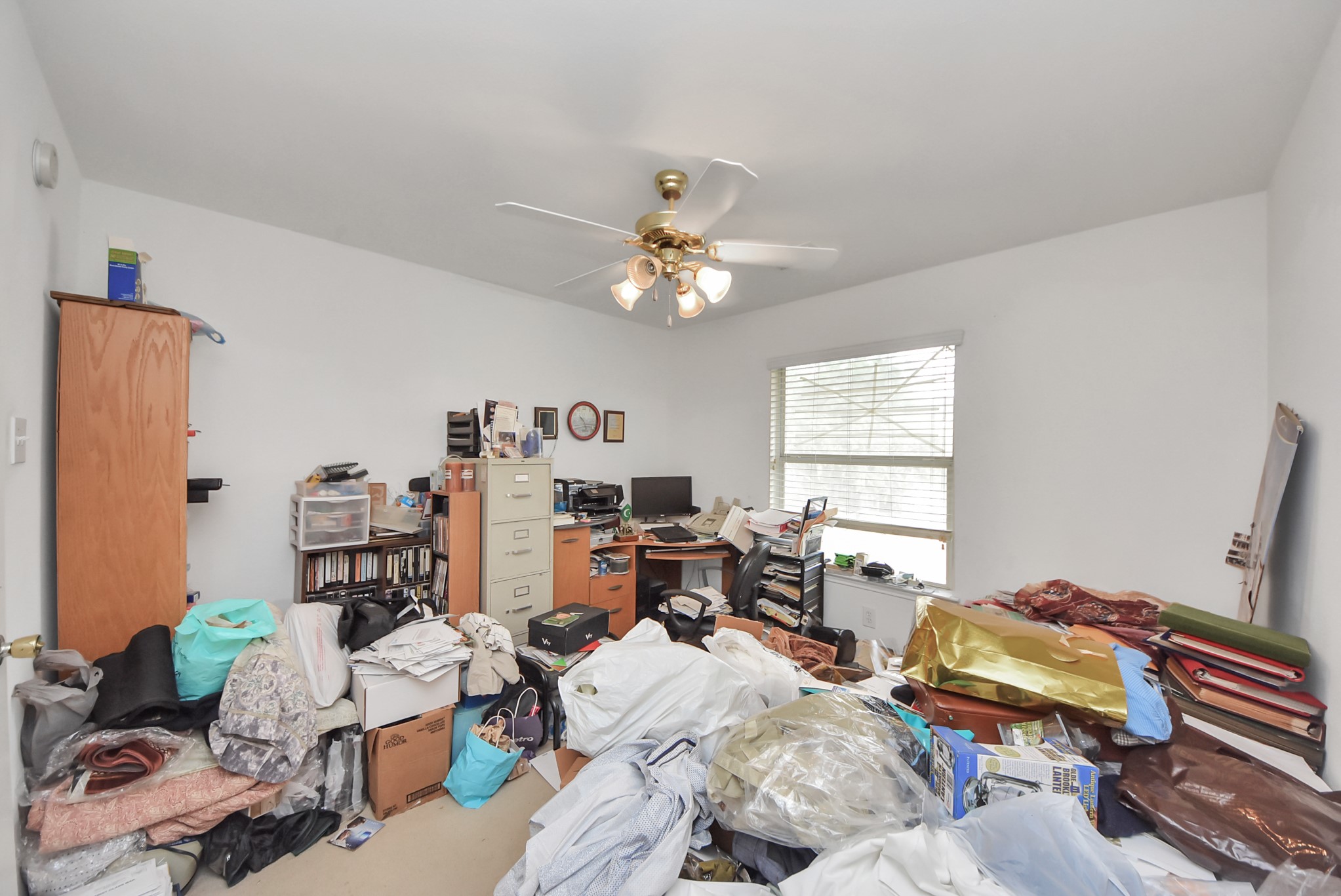 10003 Dakota Ridge Court Houston, TX 77095 - Photo 20 of 30 a workspace with furniture and a chandelier fan