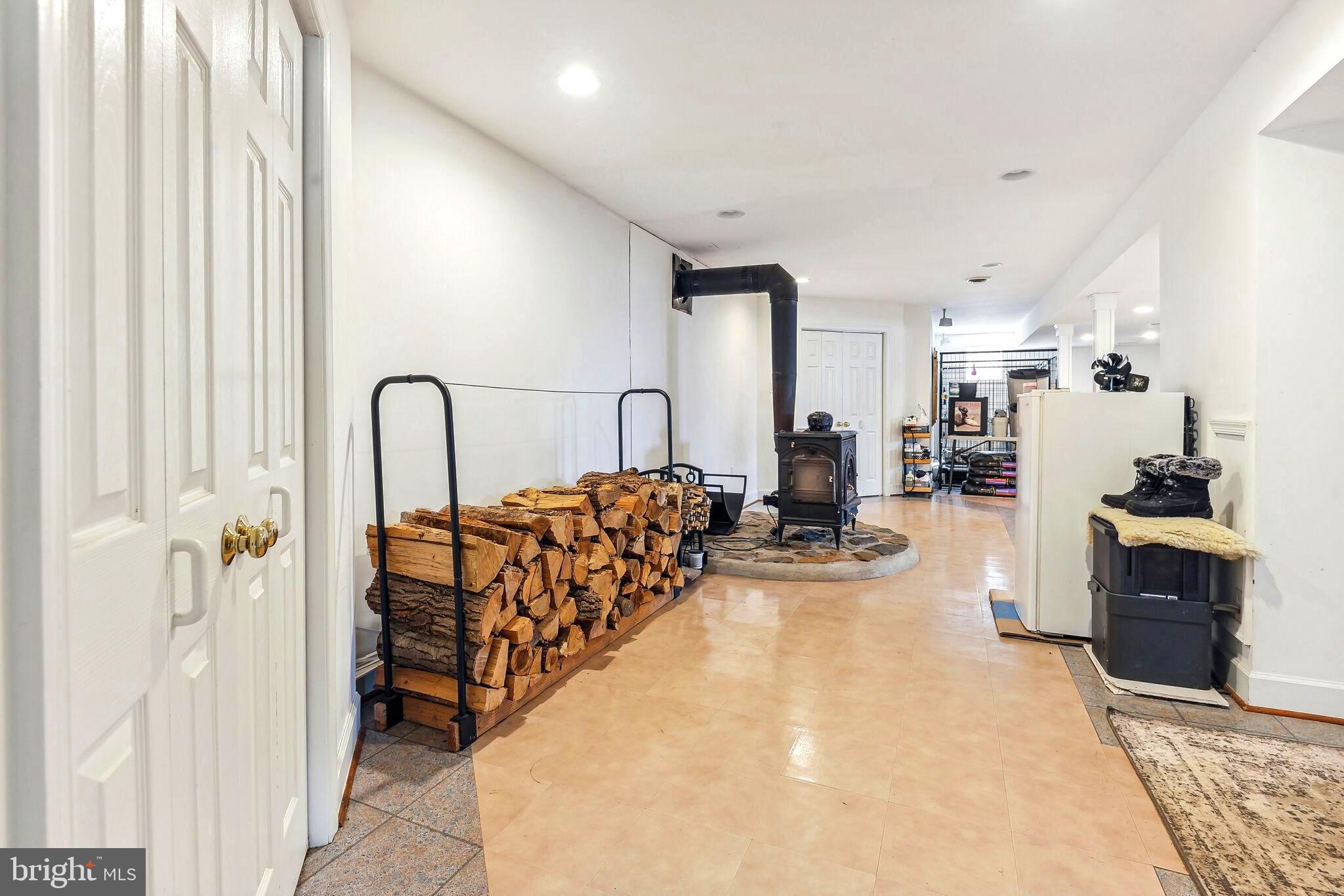 14358 Loyalty Road Leesburg, VA 20176 - Photo 42 of 58 Wood stove in basement