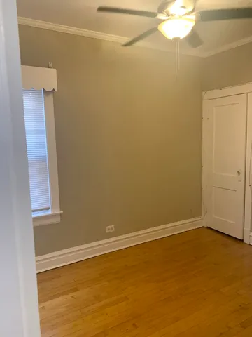 an empty room with a mirror