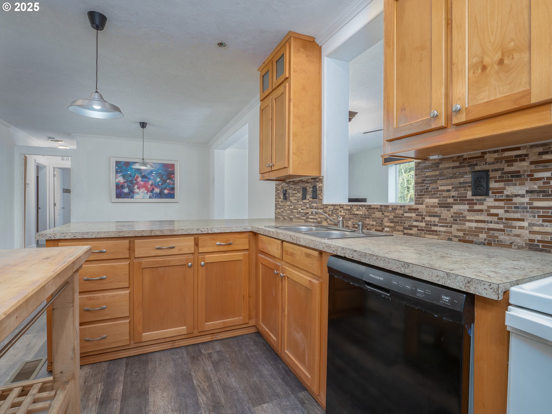 44300 Southeast Sandercock Lane Sandy, OR 97055 - Photo 14 of 48 a kitchen with granite countertop stainless steel appliances sink and cabinets