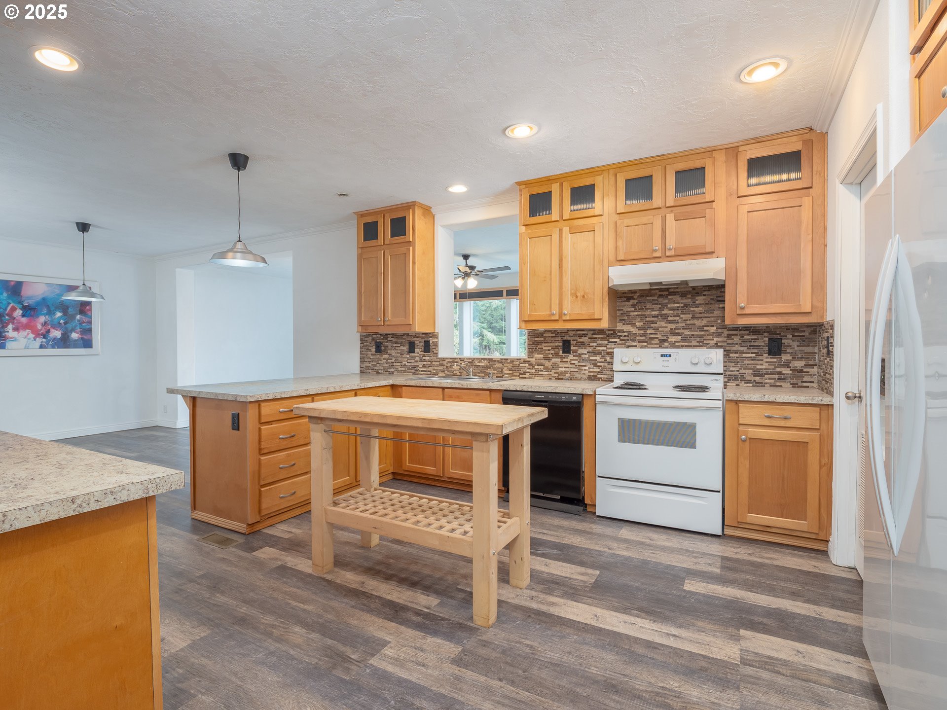 44300 Southeast Sandercock Lane Sandy, OR 97055 - Photo 16 of 48 a kitchen with white cabinets and sink