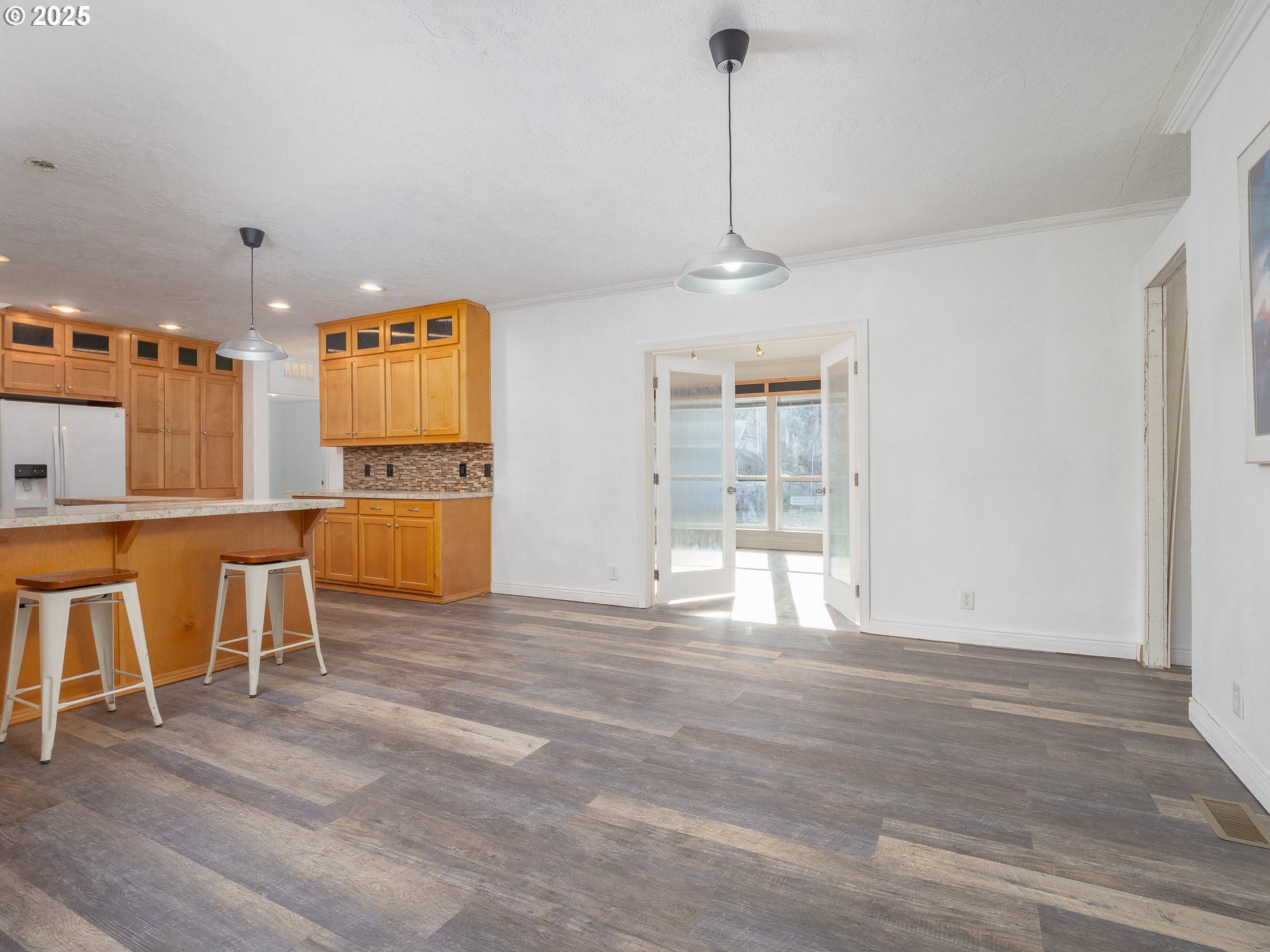 44300 Southeast Sandercock Lane Sandy, OR 97055 - Photo 18 of 48 a view of a kitchen with furniture and wooden floor
