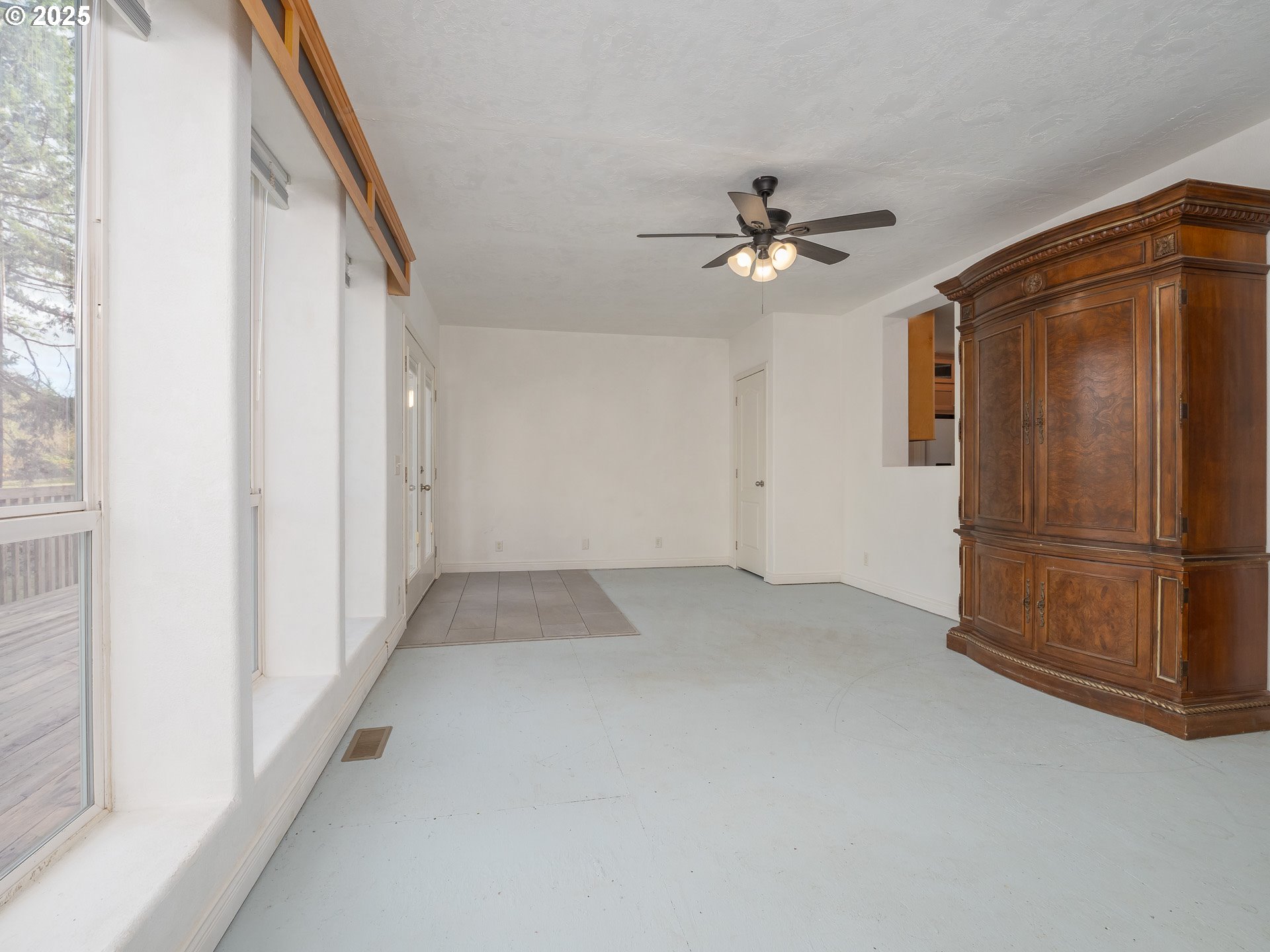 44300 Southeast Sandercock Lane Sandy, OR 97055 - Photo 21 of 48 a view of empty room with ceiling fan