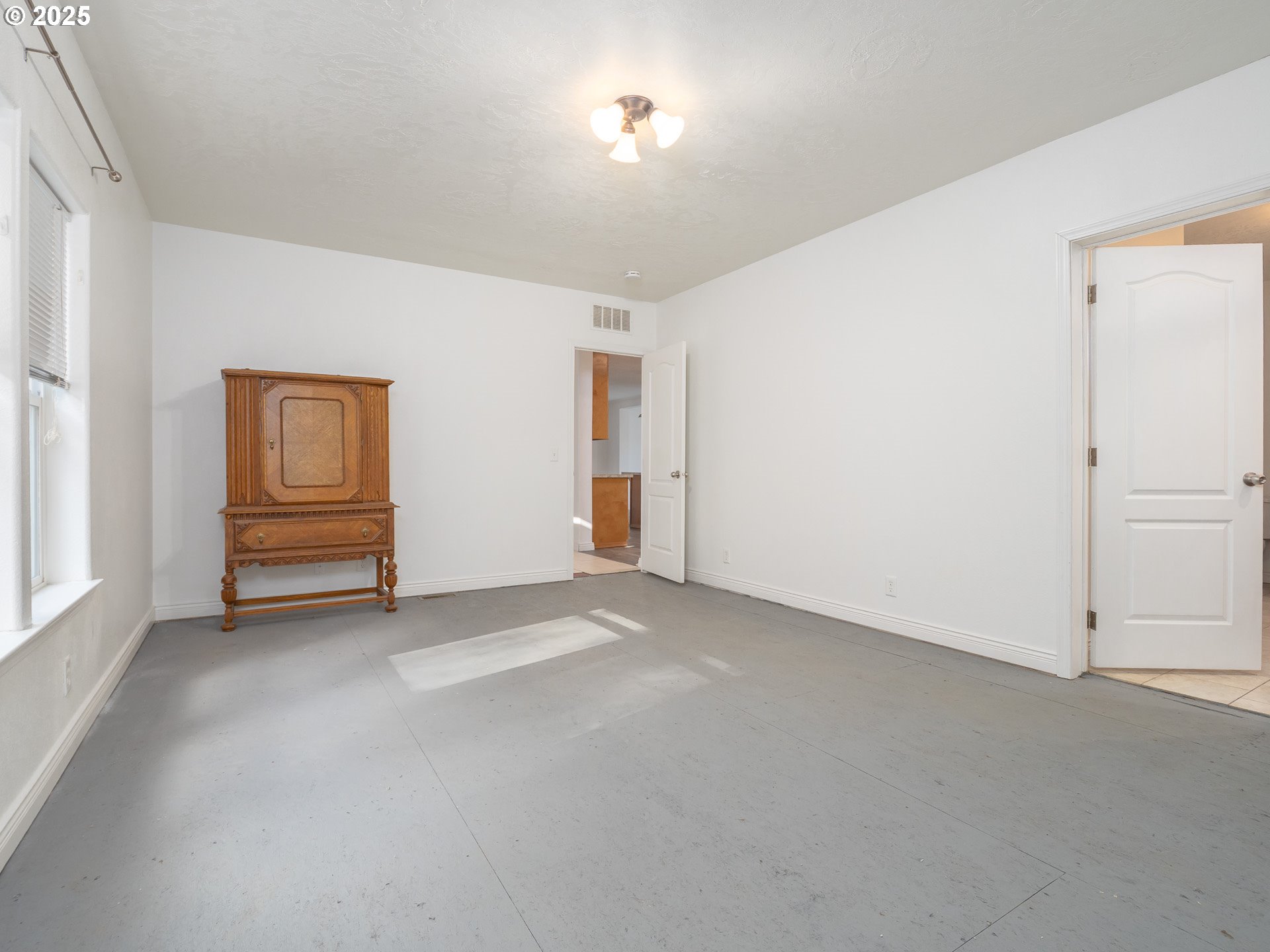 44300 Southeast Sandercock Lane Sandy, OR 97055 - Photo 25 of 48 a view of an empty room with a fireplace