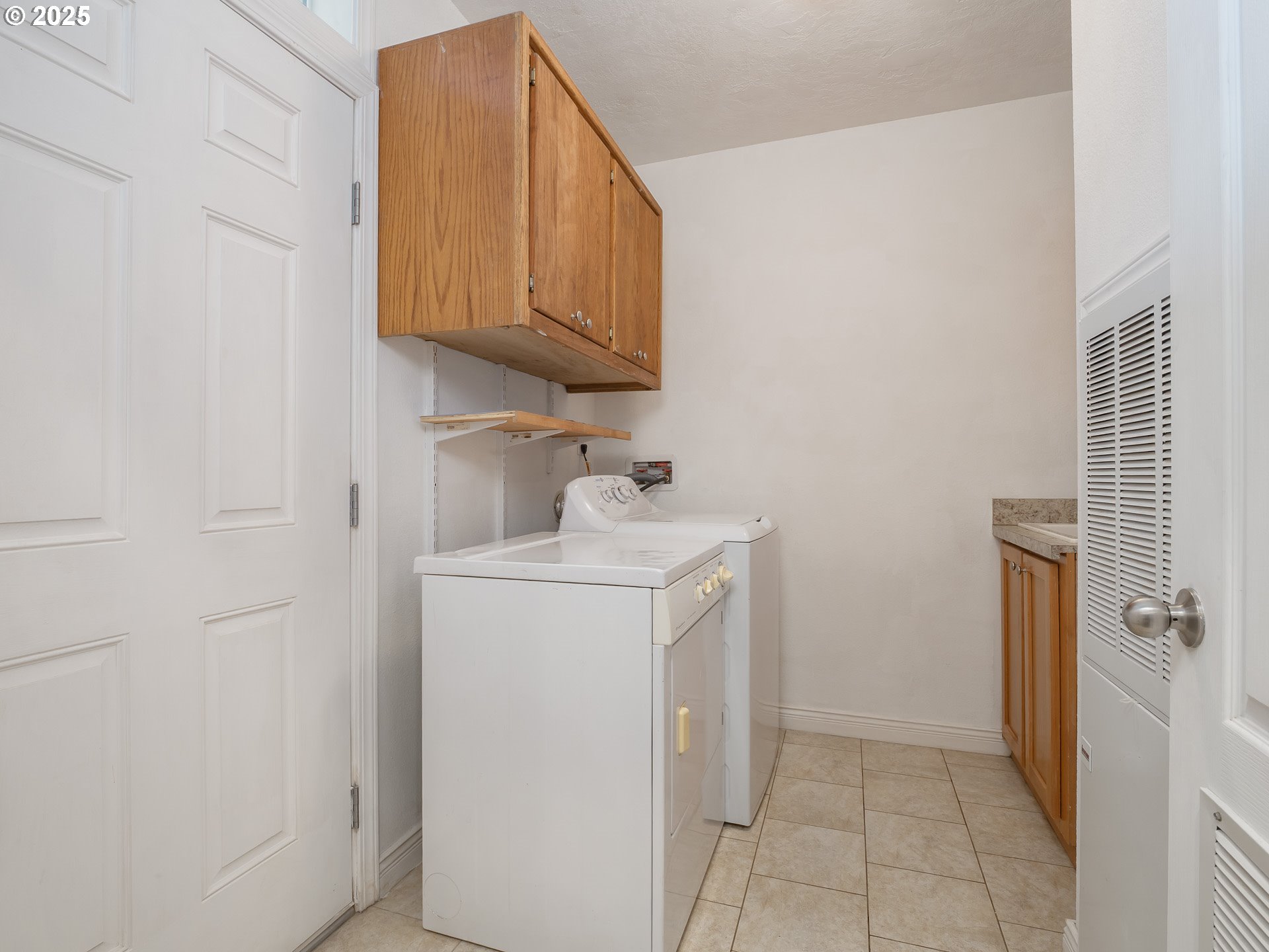 44300 Southeast Sandercock Lane Sandy, OR 97055 - Photo 26 of 48 a utility room with a sink washer and dryer