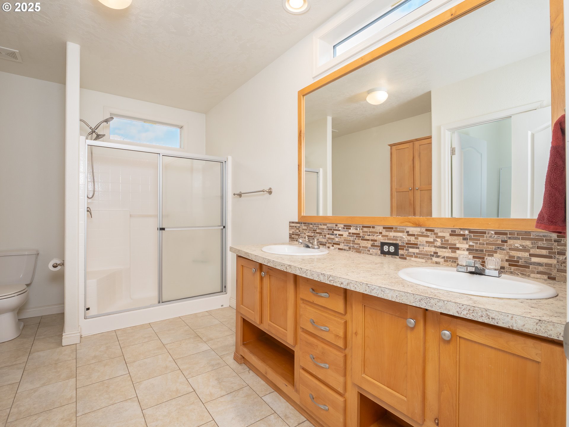 44300 Southeast Sandercock Lane Sandy, OR 97055 - Photo 27 of 48 a bathroom with a sink and a mirror